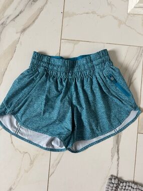 lululemon teal heathered running shorts with zip pocket Track That 3in